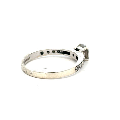 9ct white gold mossainte ring in size R, featuring a detailed mossainte gemstone setting on a sleek band.
