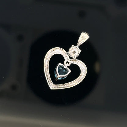 9ct white gold pendant weighing 1.2g, unbranded jewelry piece with elegant design, shown in a close-up image.