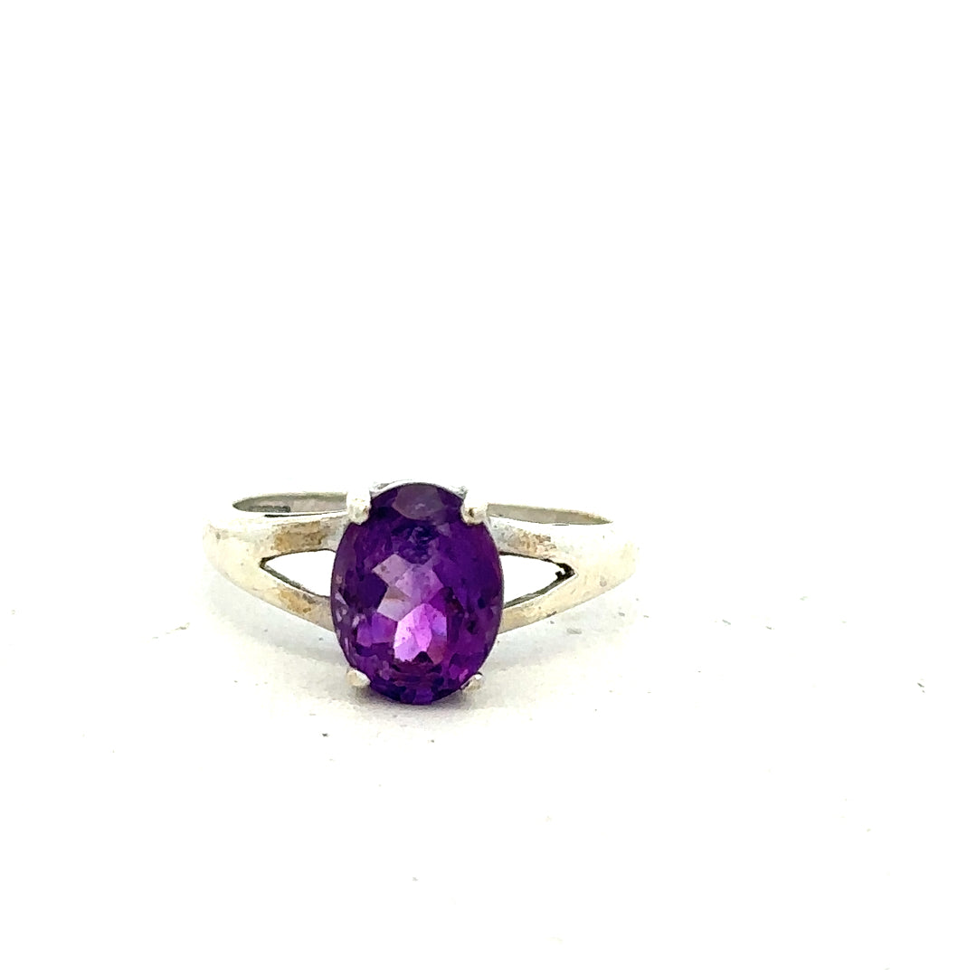 9ct white gold ring in size K, showcasing a sleek, polished design with a smooth band and subtle shine.
