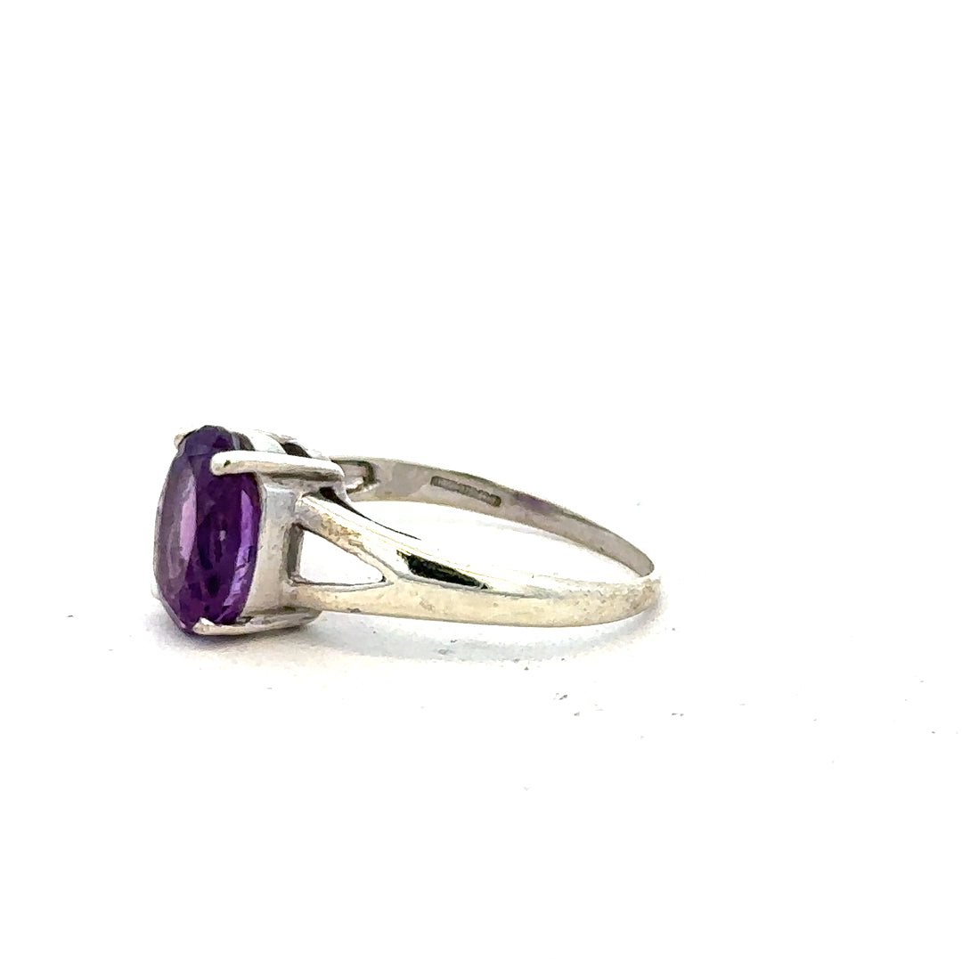 9ct white gold ring in size K with a smooth, polished band, unbranded, showcasing elegant jewelry craftsmanship.