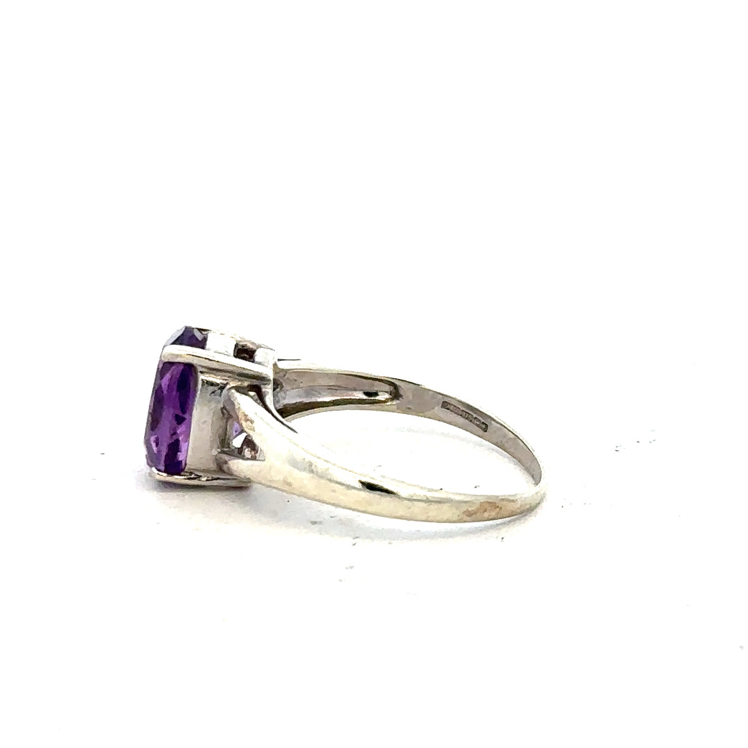 9ct white gold ring size K with a smooth band, unbranded, showcasing a polished finish and elegant design.
