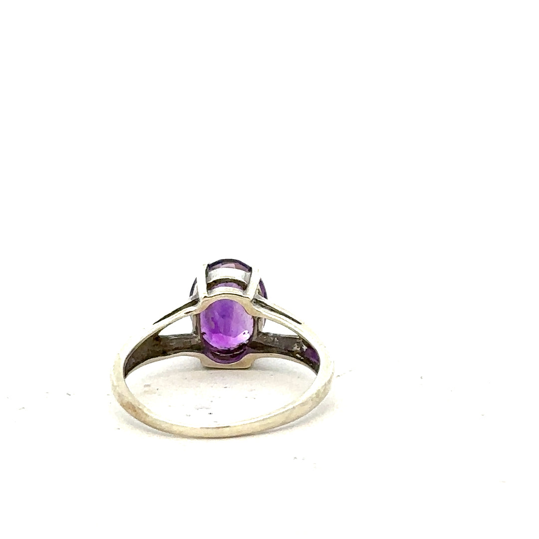 9ct white gold ring size K with a simple band design, showcasing a polished finish and elegant craftsmanship.