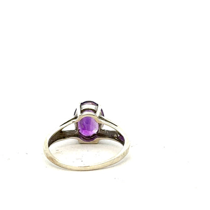 9ct white gold ring size K with a simple band design, showcasing a polished finish and elegant craftsmanship.