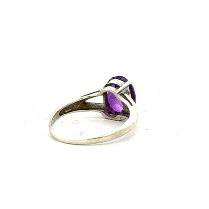 9ct white gold ring in size K with a sleek, polished finish, showcasing elegant craftsmanship and smooth band design.