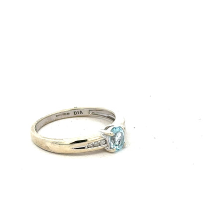 9ct white gold ring in size L with a smooth band, unbranded jewelry showcasing fine craftsmanship.