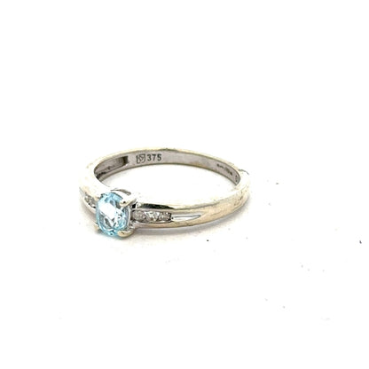 9ct white gold ring in size L with a smooth band, styled simply, unbranded jewelry for elegant everyday wear.