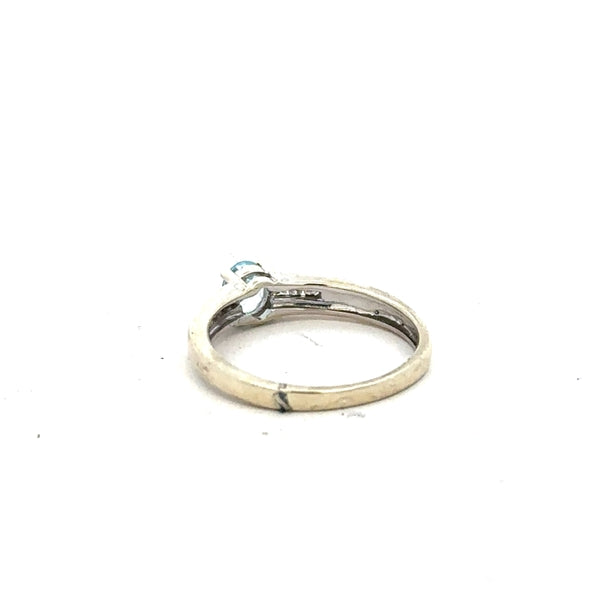 9ct white gold ring in size L with a smooth band, unbranded jewelry piece with a polished finish.