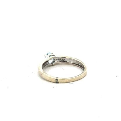 9ct white gold ring in size L with a smooth band, unbranded jewelry piece with a polished finish.