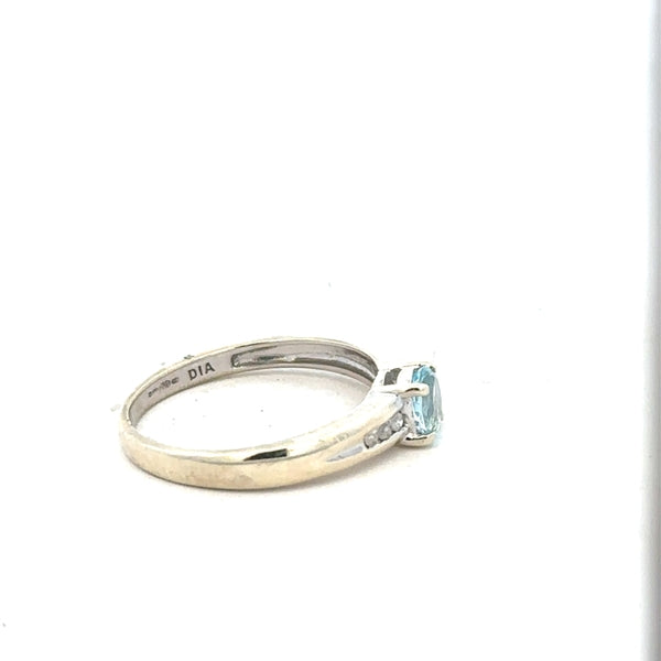 9ct white gold ring in size L with a smooth band, unbranded, showcasing elegant jewelry craftsmanship.