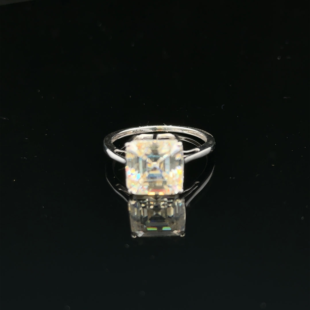 9ct white gold ring in size L with a smooth polished band, unbranded, shown on a plain background.