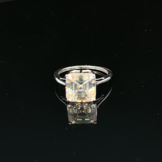 9ct white gold ring in size L with a smooth polished band, unbranded, shown on a plain background.