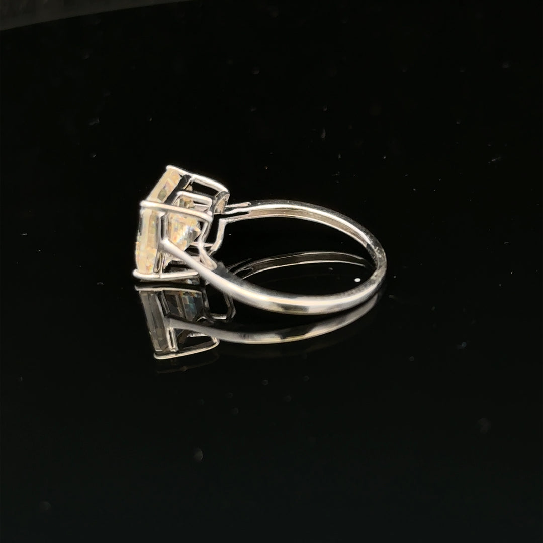 9ct white gold ring in size L with a sleek, polished finish, showcasing a classic and elegant jewelry design.