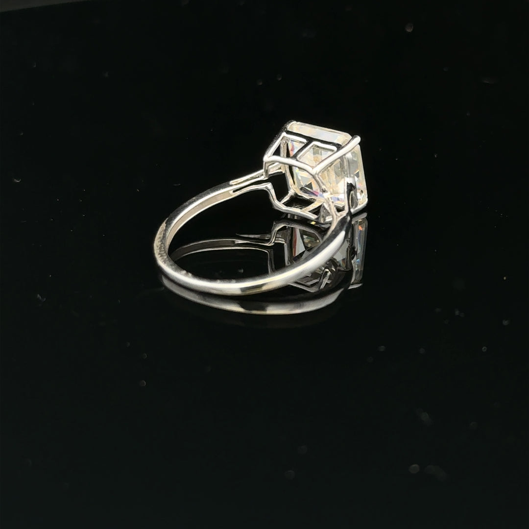 9ct white gold ring in size L, featuring a smooth polished band, unbranded jewelry ring for everyday wear.