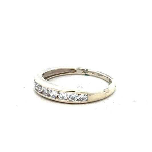 9ct white gold ring in size L with a smooth, polished band, displayed on a neutral background showing close-up detail.