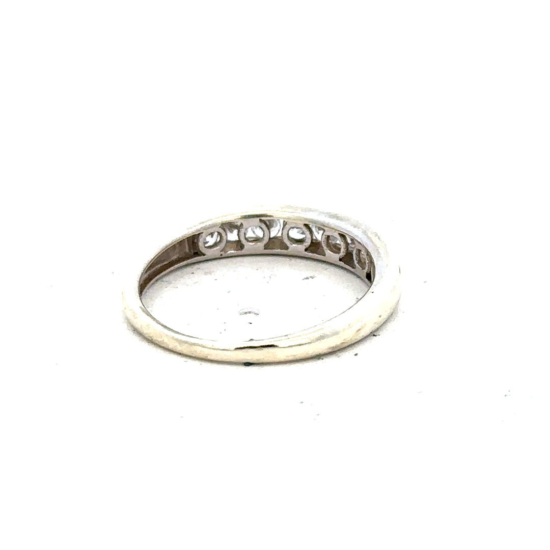 9ct white gold ring in size L with a smooth, polished finish, showcased on a plain background.