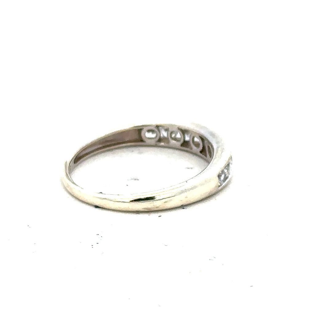 9ct white gold ring size L with a smooth band, unbranded, shiny finish, and detailed close-up of the jewelry.