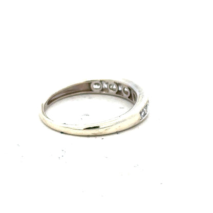 9ct white gold ring size L with a smooth band, unbranded, shiny finish, and detailed close-up of the jewelry.