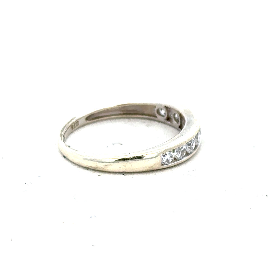9ct white gold ring in size L with a smooth band, unbranded jewelry, displayed on a neutral background.