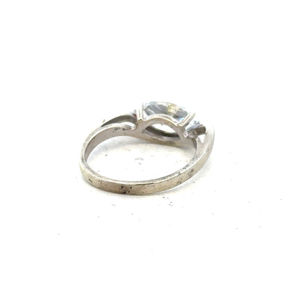 9ct white gold ring size O with a smooth band, displayed against a neutral background. Unbranded jewelry piece.