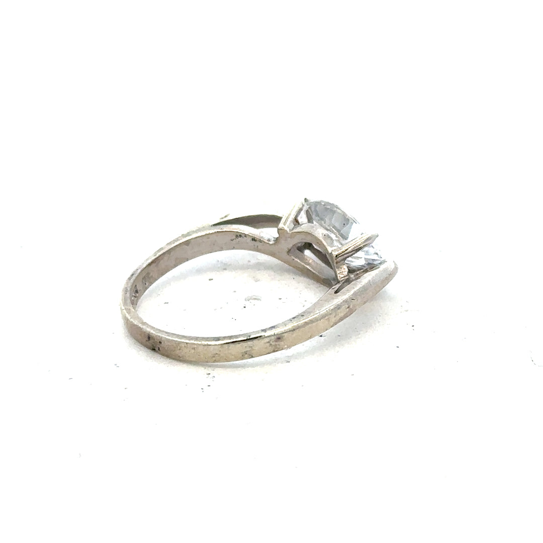 9ct white gold ring in size O, featuring a sleek, polished design with a smooth band, unbranded jewelry for elegant wear.