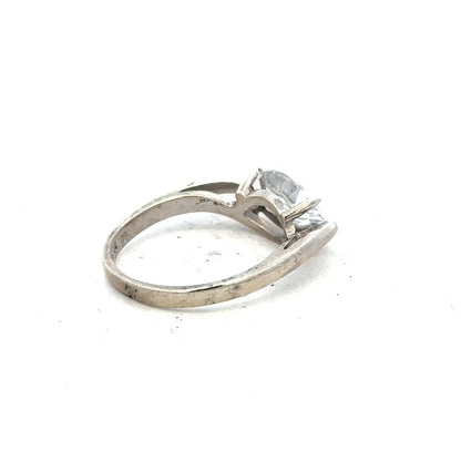 9ct white gold ring in size O, featuring a sleek, polished design with a smooth band, unbranded jewelry for elegant wear.