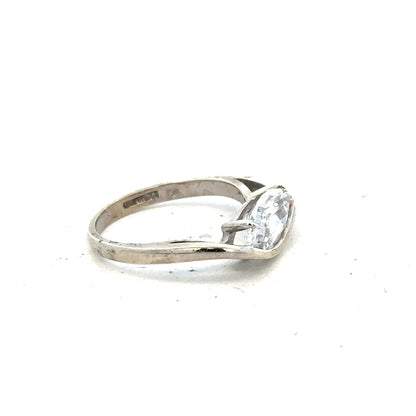 9ct white gold ring size O with a smooth band, unbranded, showcasing a polished finish and elegant design.