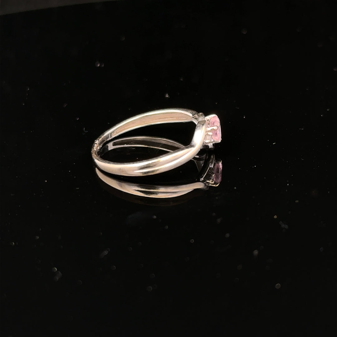 9ct white gold ring in size O with a sleek band, unbranded, displayed against a neutral background.