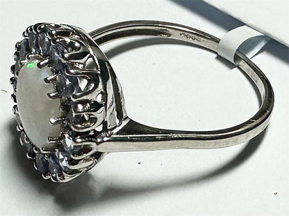 9ct white gold ring in size S with a sleek, polished finish, showcasing elegant craftsmanship and a smooth band design.