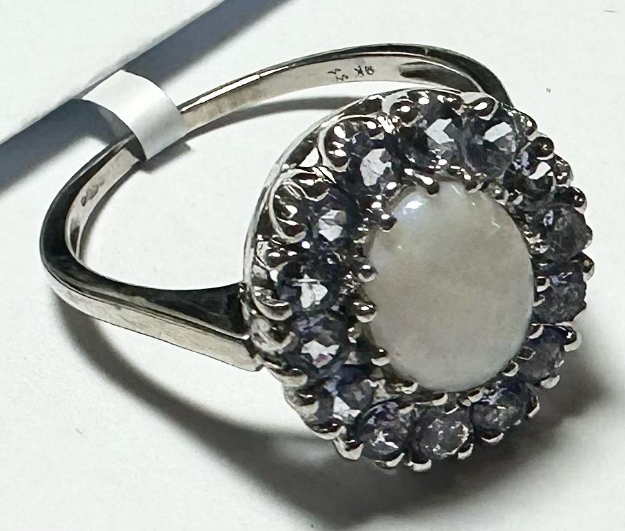 9ct white gold ring size S with a smooth band, unbranded jewelry, showcasing a sleek and elegant design.