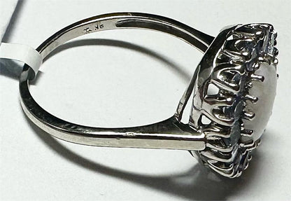 9ct white gold ring in size S, featuring a simple polished band, unbranded jewelry, shown on a plain background.