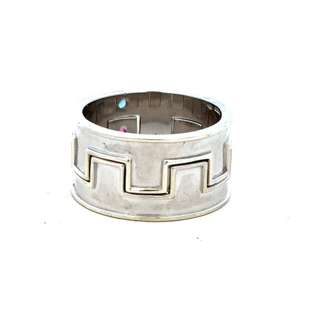 9ct white gold ring size Z4 with a smooth polished band, unbranded jewelry piece shown from a side angle.