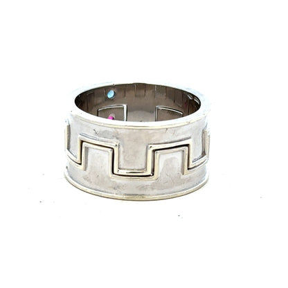 9ct white gold ring size Z4 with a smooth polished band, unbranded jewelry piece shown from a side angle.