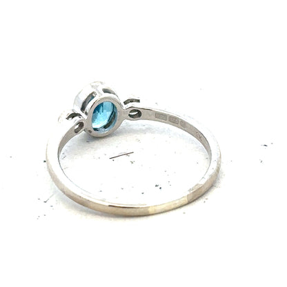9ct white gold topaz and diamond ring in size Q, featuring a sparkling gemstone and elegant design.