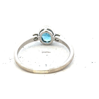 9ct white gold topaz and diamond ring in size Q, featuring a sparkling gemstone and elegant design.