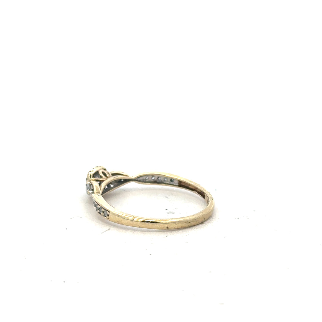 9ct yellow gold diamond ring with 0.33 carats, size S, featuring a sparkling gemstone and elegant band.
