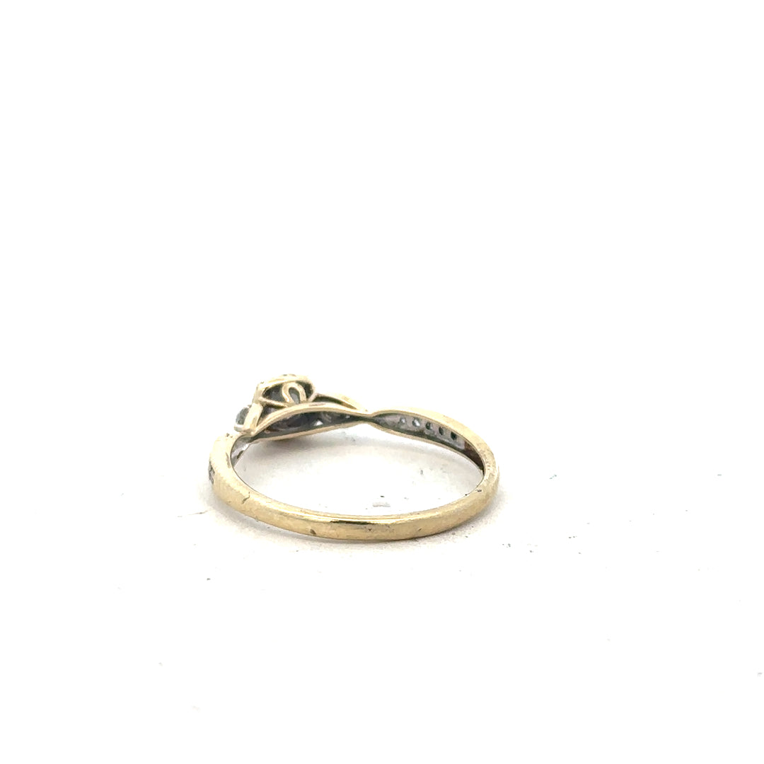 9ct yellow gold diamond ring with 0.33 carats, size S, featuring a sparkling diamond set in a classic band.