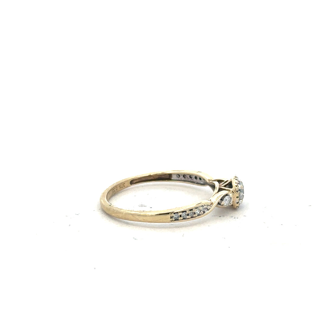 9ct yellow gold diamond ring with 0.33ct center stone, size S, featuring a classic design with sparkling diamonds.