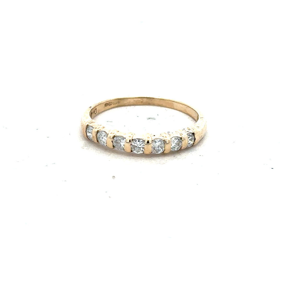 9ct yellow gold diamond ring with 0.40 carat center stone, size N, featuring a delicate band and sparkling gemstones.
