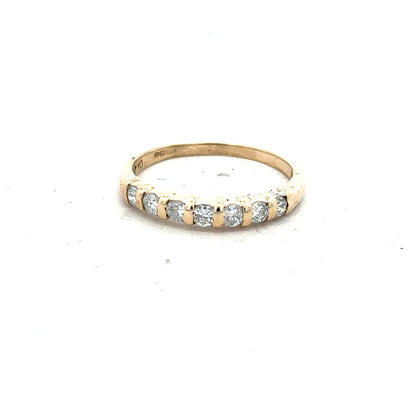 9ct yellow gold diamond ring with 0.40 carat center stone, size N, featuring a delicate band and sparkling gemstones.