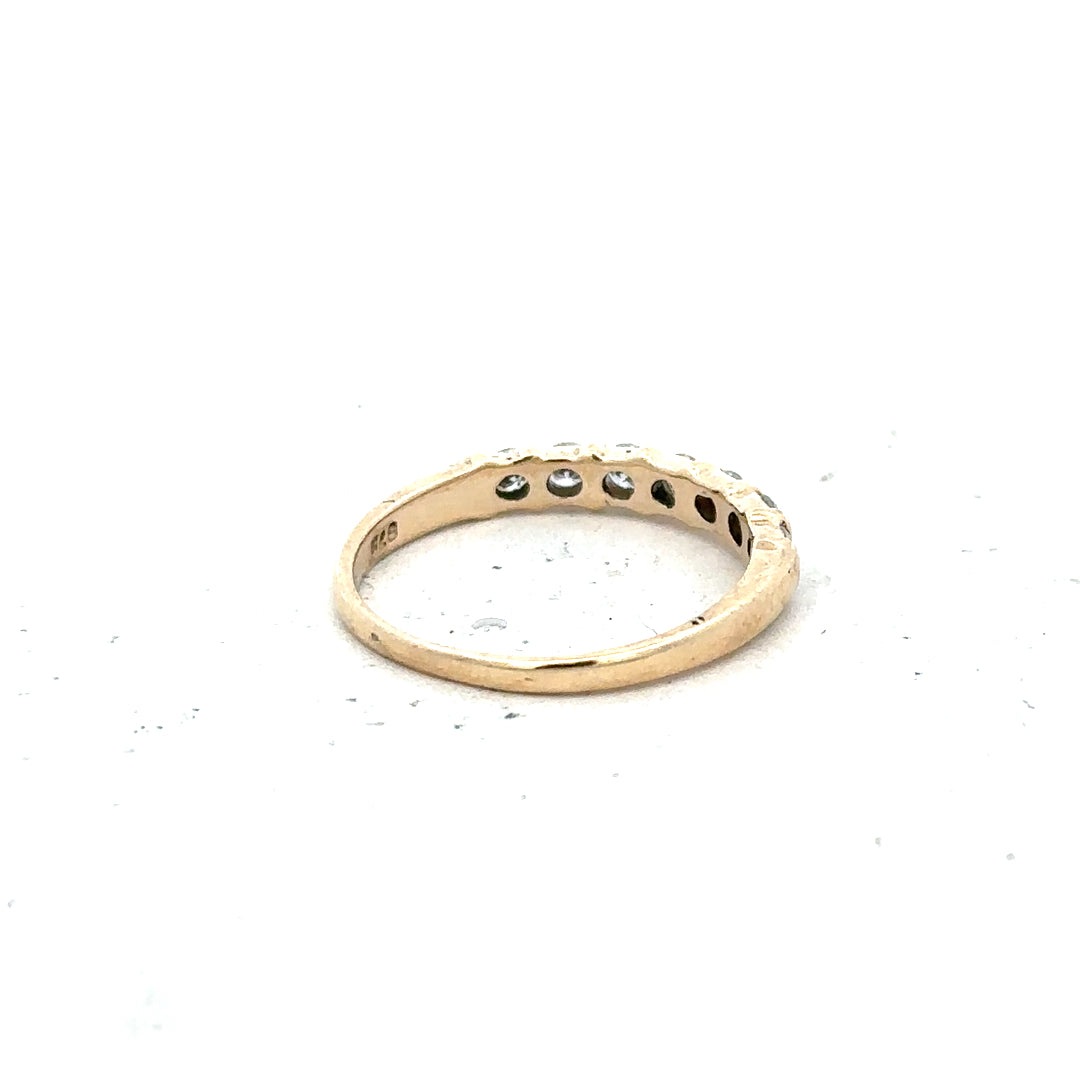 9ct yellow gold diamond ring with 0.40 carats, size N, featuring a sparkling central diamond on a classic band.