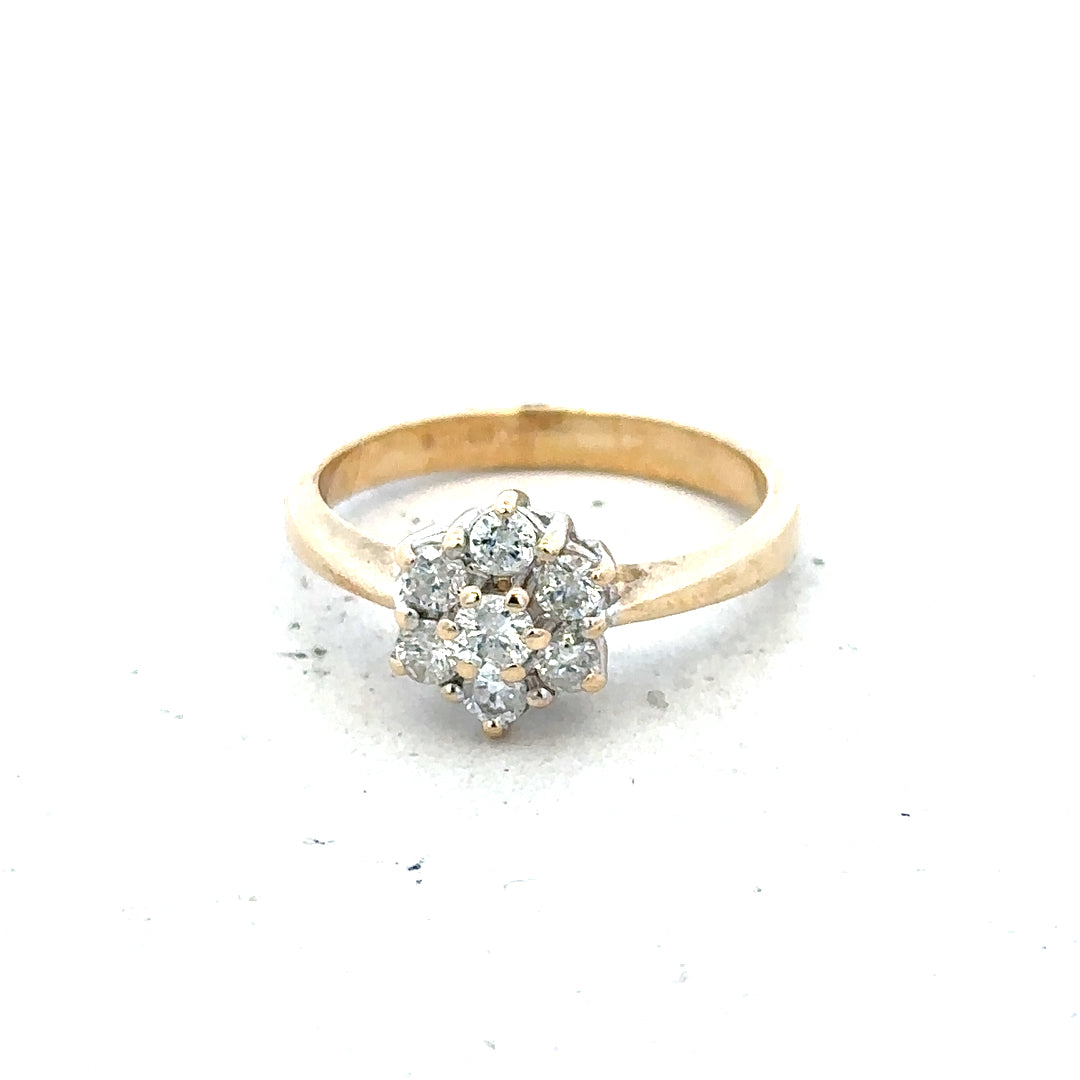 9ct yellow gold diamond ring with 1/2 carat center stone, size N, featuring a simple elegant design and sparkling diamonds.