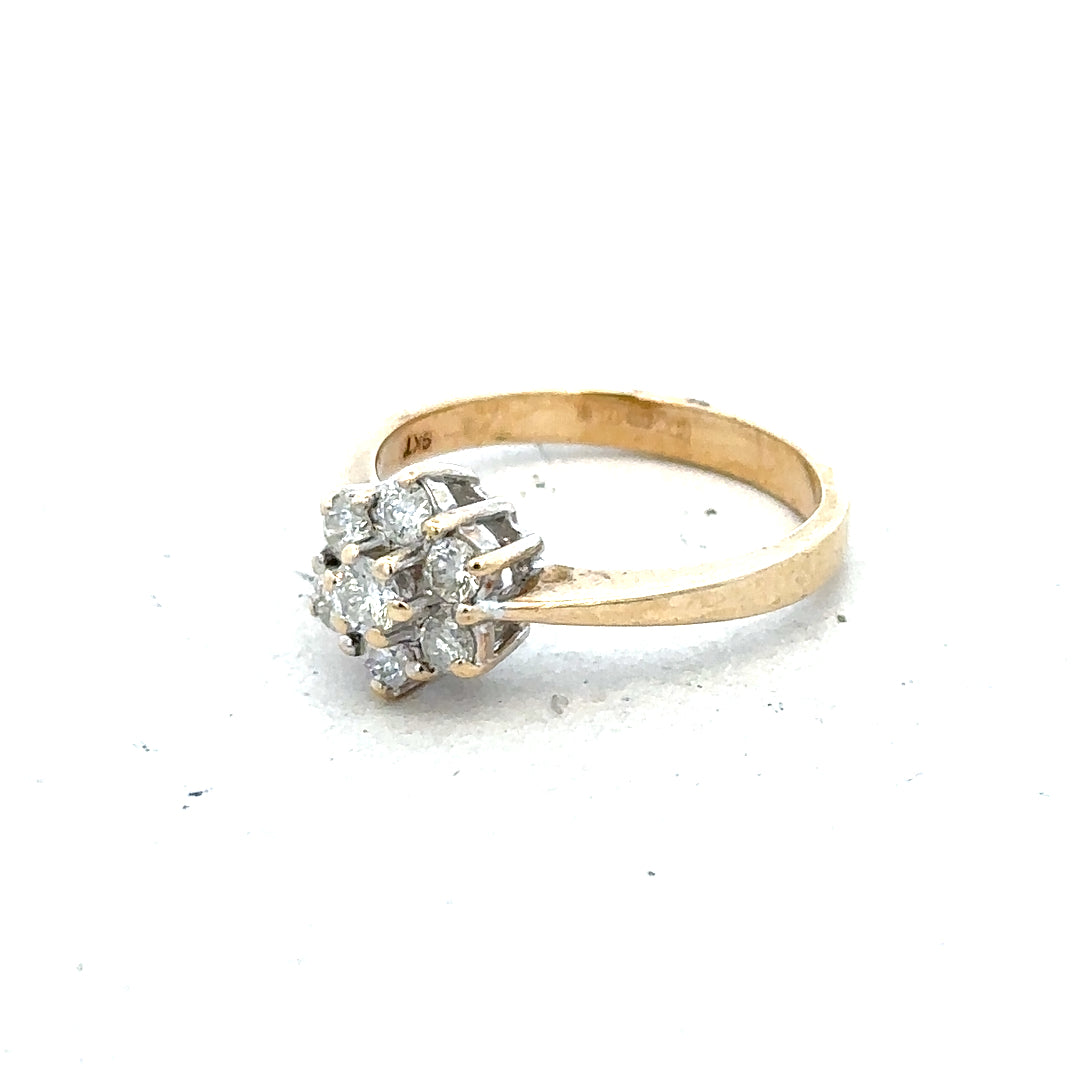 9ct yellow gold diamond ring with 1/2 carat total weight, size N, featuring a sparkling central diamond.