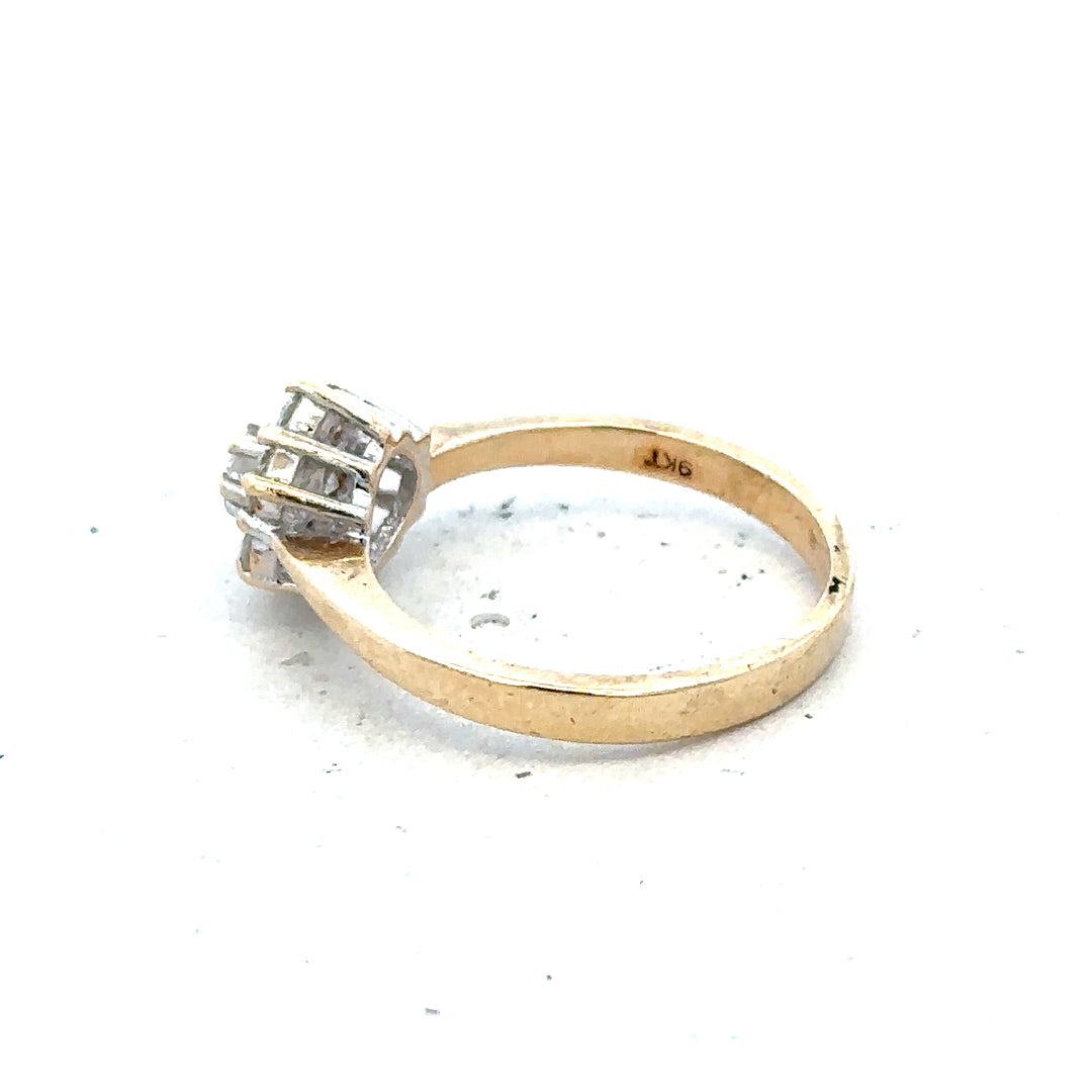 9ct yellow gold diamond ring with 1/2 carat total weight, size N, featuring a sparkling central diamond.