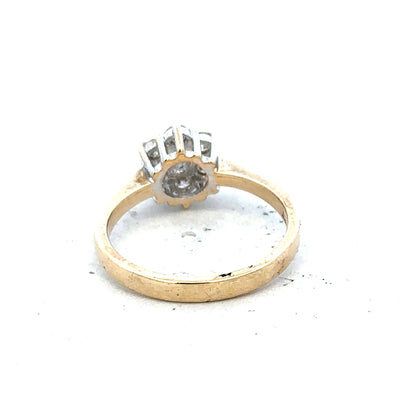 9ct yellow gold diamond ring with 1/2 carat total weight in size N, showcasing a sparkling central diamond and elegant band.
