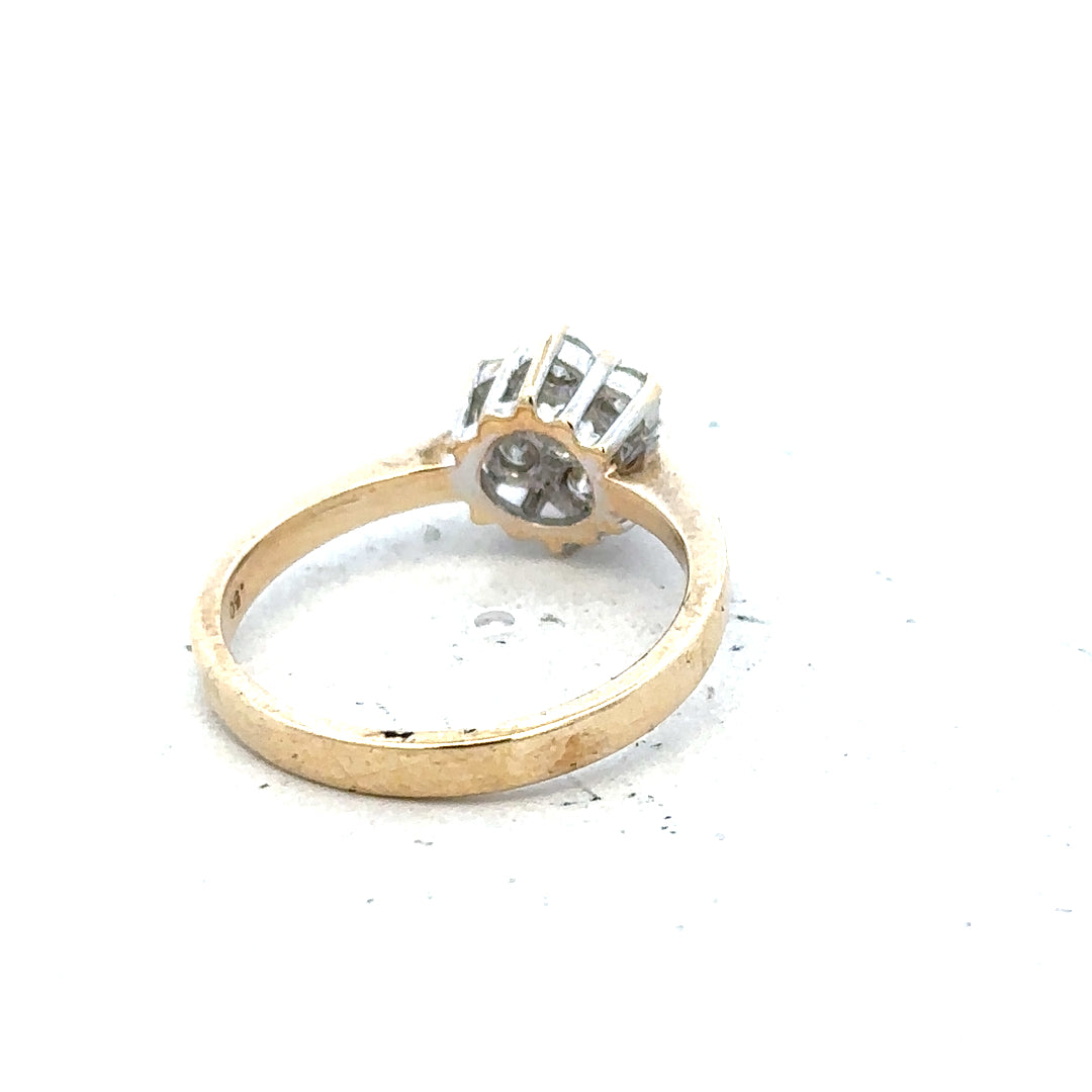 9ct yellow gold diamond ring with 1/2 carat center stone in size N, featuring a classic design and sparkling diamonds.