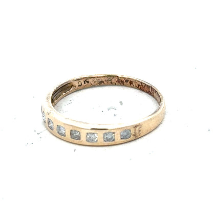 9ct yellow gold diamond ring with 1/4 carat total weight, size O, featuring a sparkling central diamond.