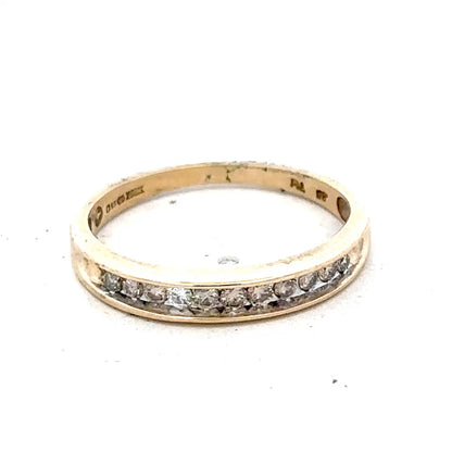 9ct yellow gold diamond ring with 1/4 carat center stone, size O 1/2, featuring a delicate band and sparkling diamond setting.