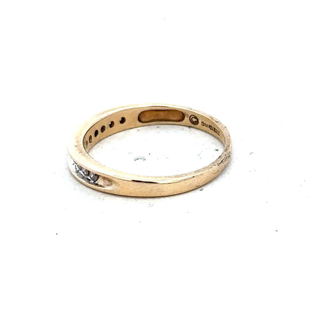 9ct yellow gold diamond ring with 1/4 carat stone in size O1/2, featuring a classic design and sparkling diamond centerpiece.