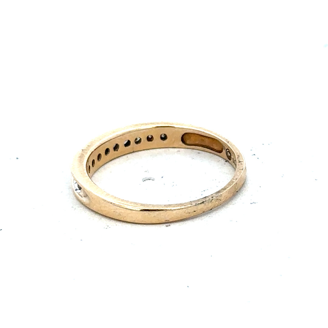9ct yellow gold diamond ring with 1/4 carat center stone, size O1/2, featuring a simple elegant design.