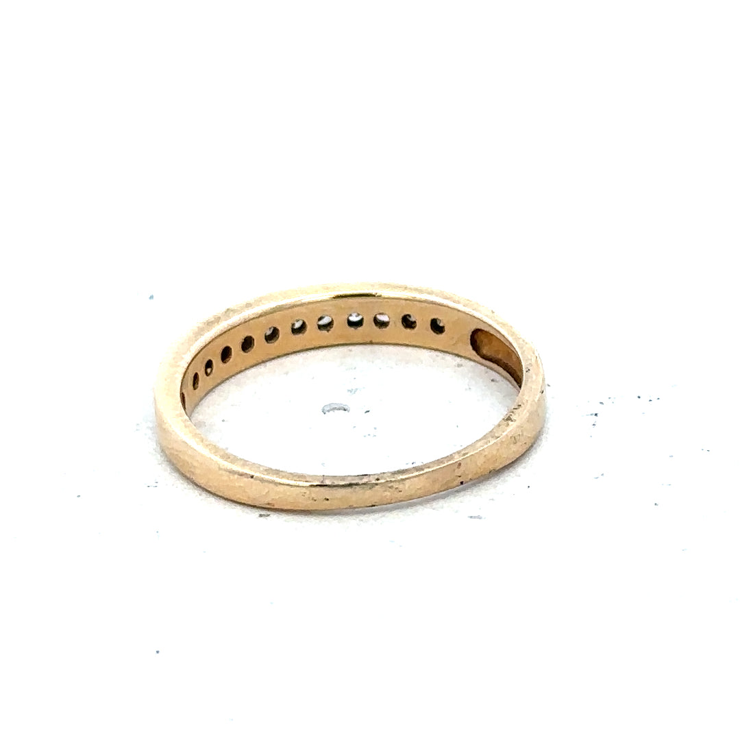 9ct yellow gold diamond ring with 1/4 carat center stone, size O1/2, featuring a classic design and sparkling diamond accents.
